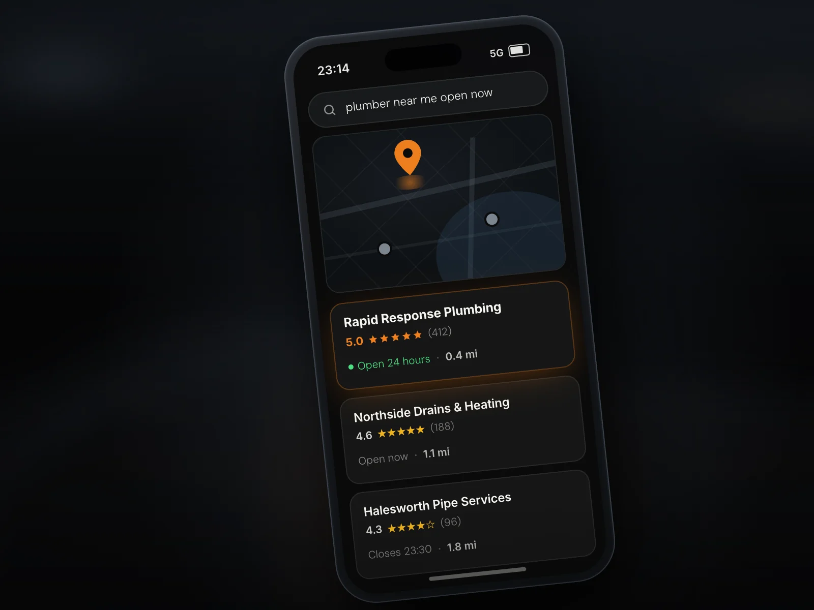 A phone showing a Google map pack for the search plumber near me open now at 23:14, with three plumbing businesses listed by rating and distance